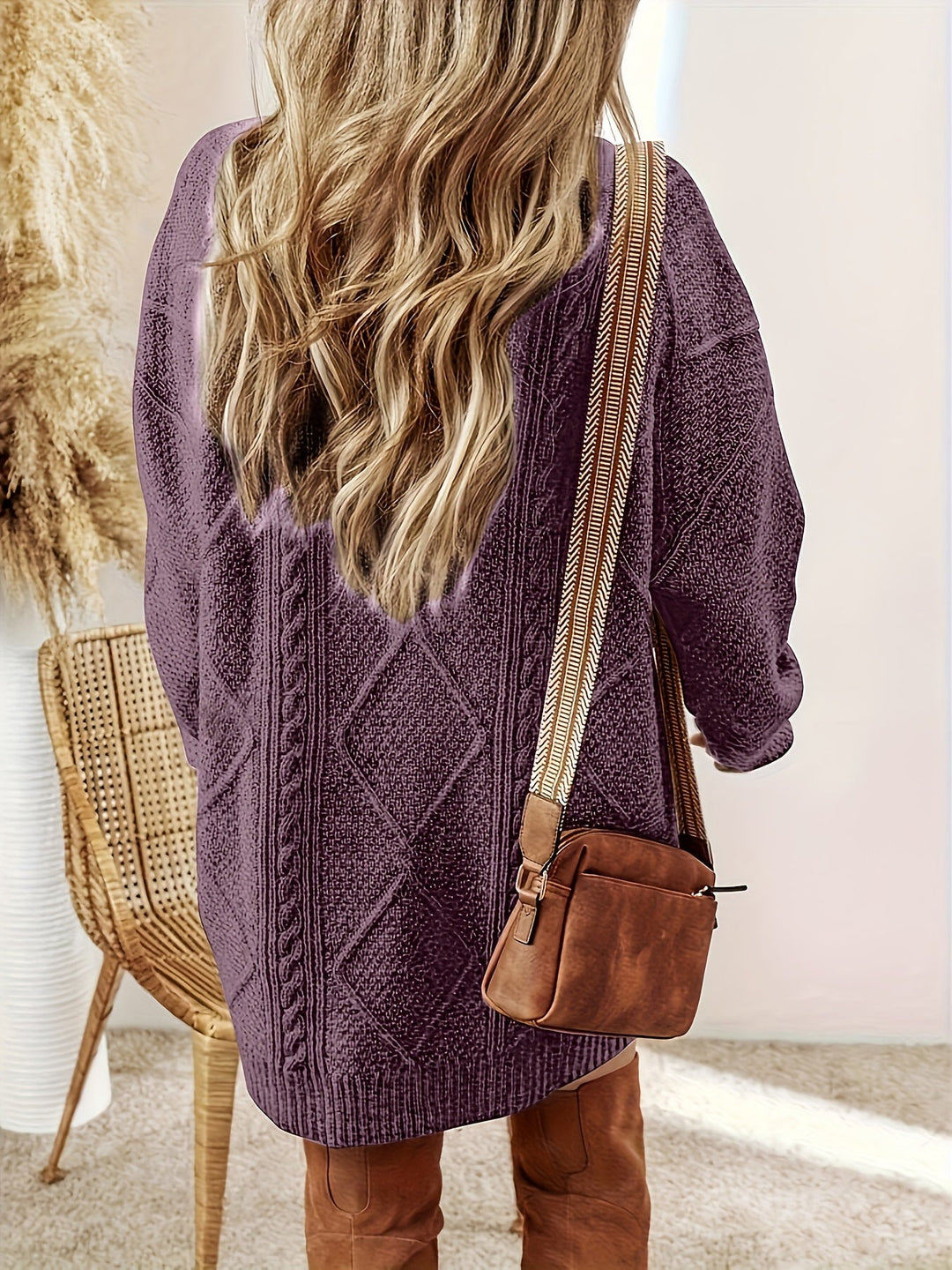 Marguerite cable-knit sweater dress, back view showing relaxed fit