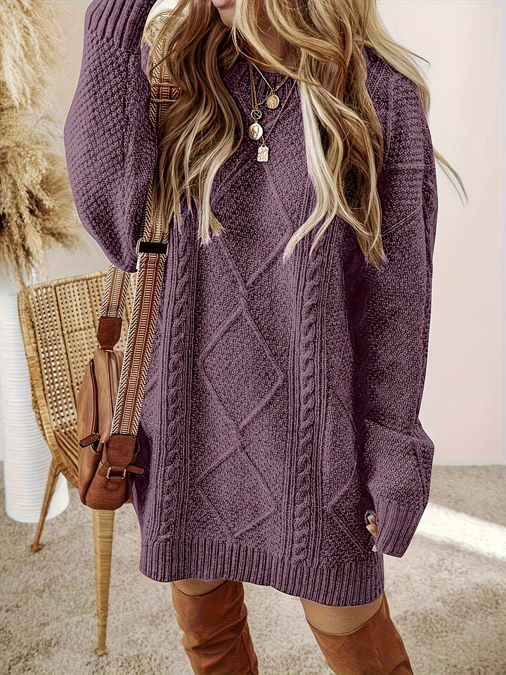 Marguerite cable-knit sweater dress, front view with layered necklaces