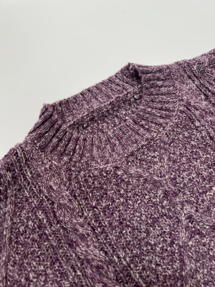 Marguerite cable-knit sweater dress, front view with layered necklaces