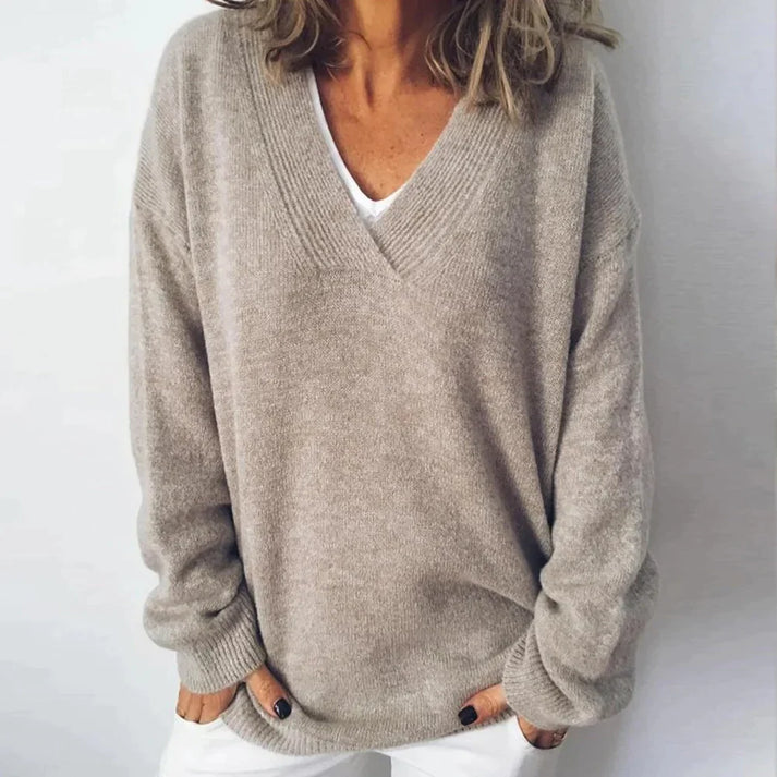 Marigold oversized V-neck long sleeve sweater, front view close-up