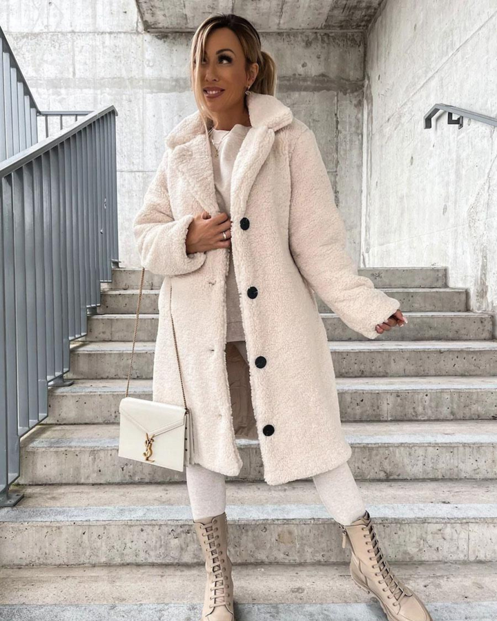 Marisol teddy coat in dark brown, back view with crossbody bag