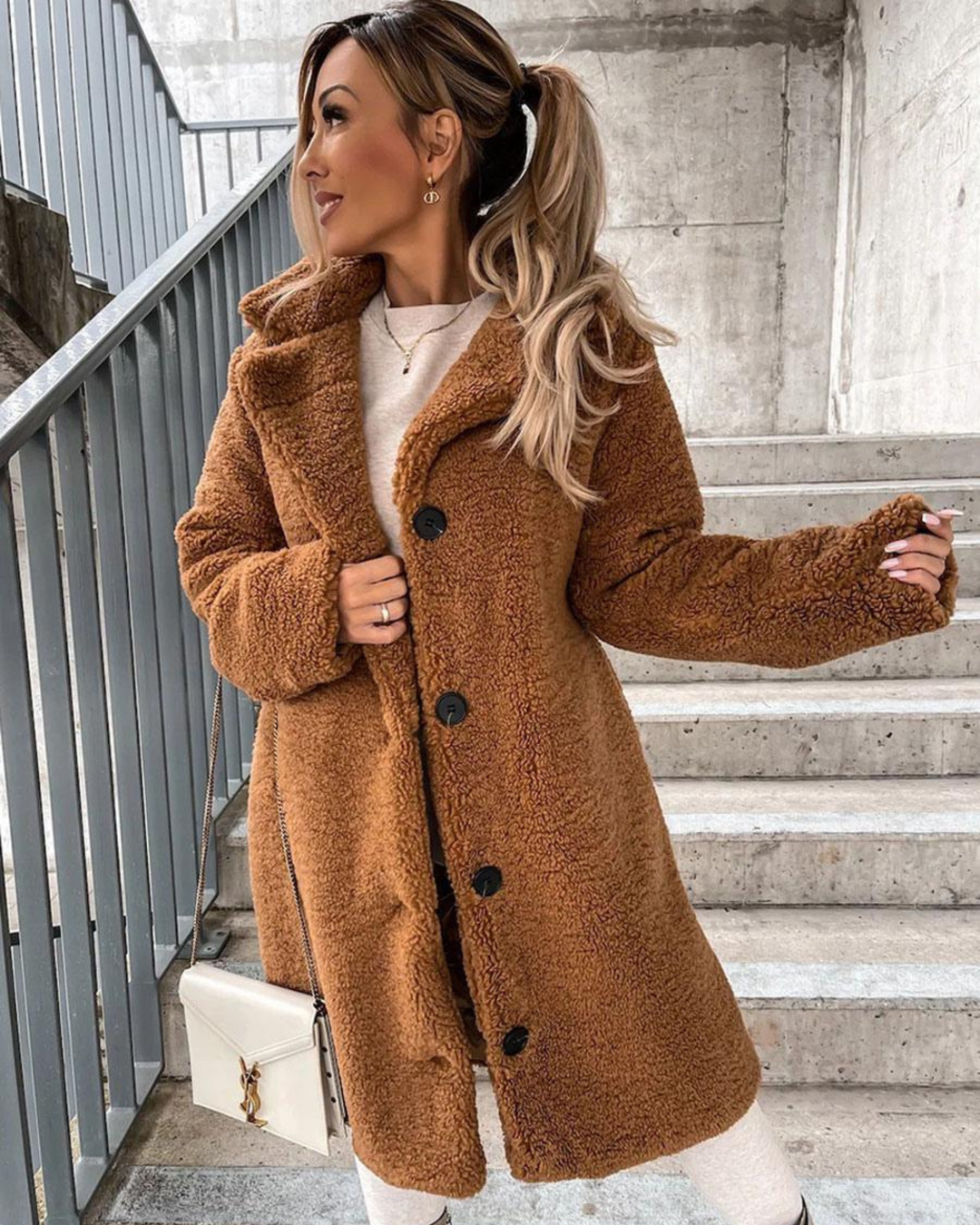 Marisol teddy coat in dark brown, back view with crossbody bag