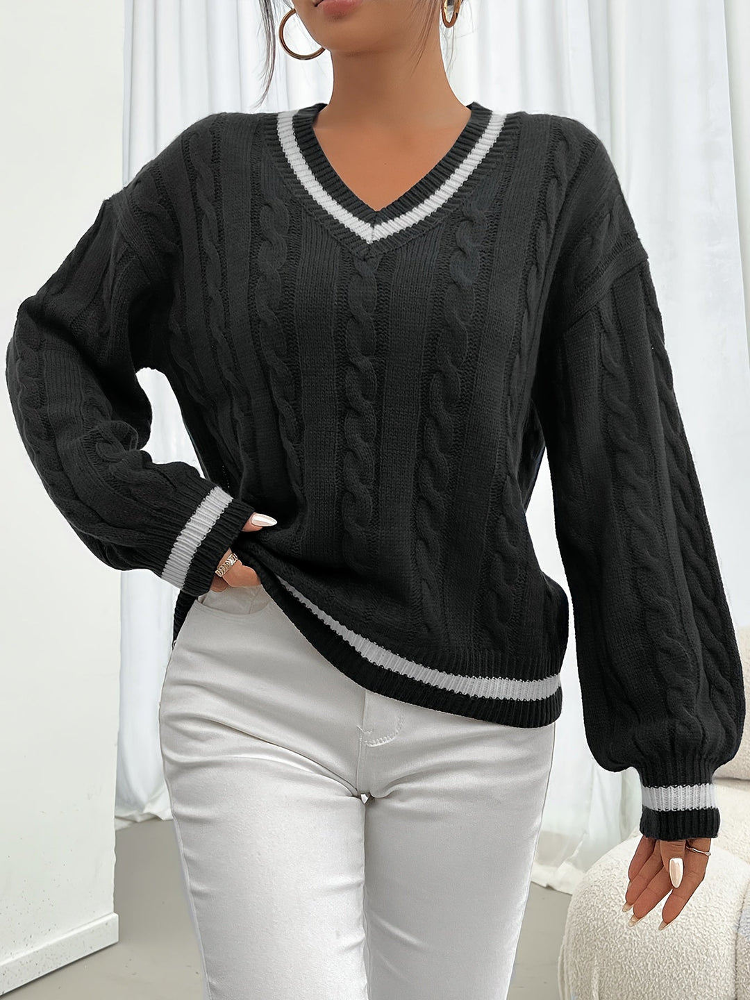 Marlowe V-neck sweater styled with white pants, front view