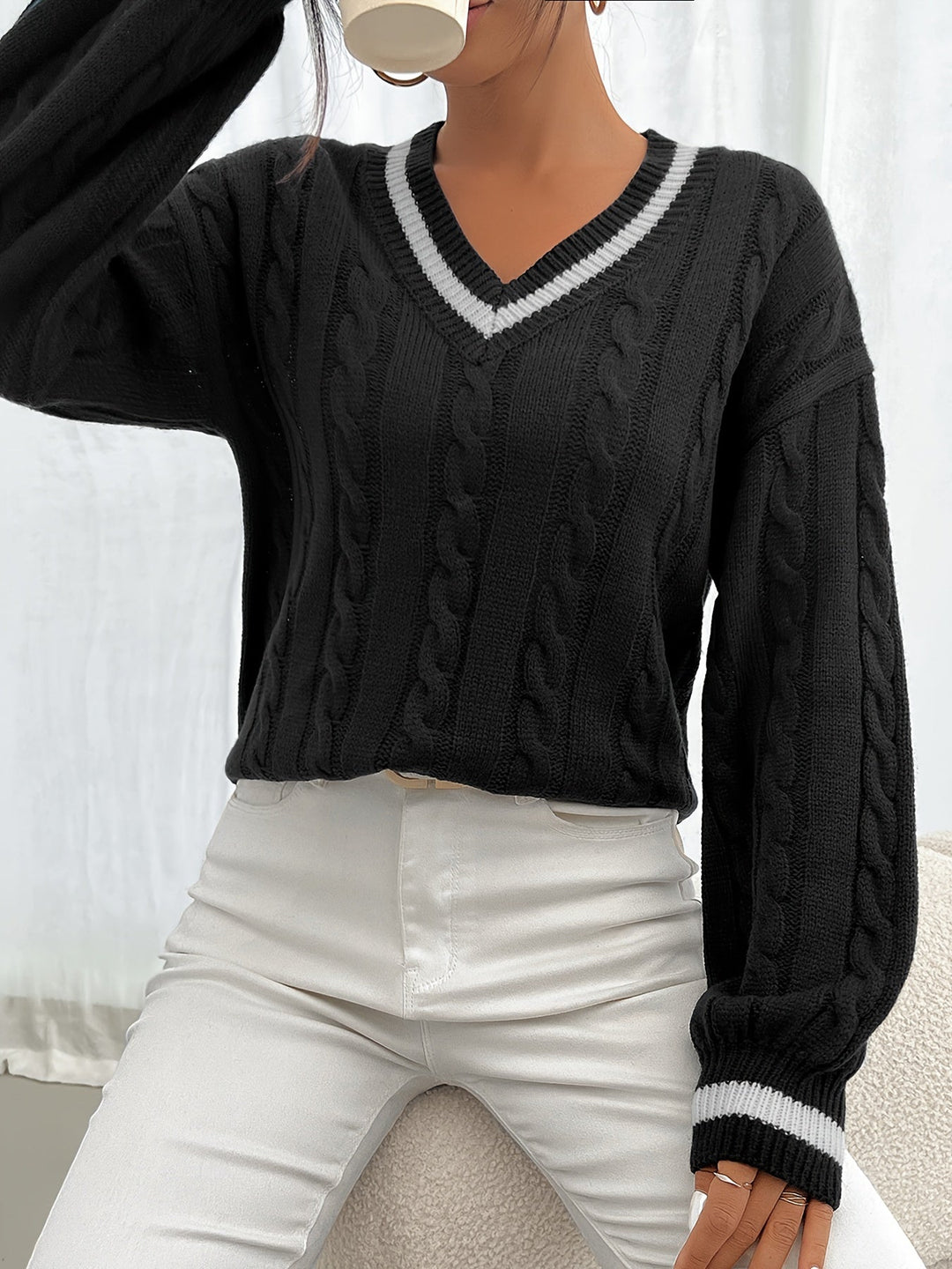 Marlowe V-neck sweater styled with white pants, front view