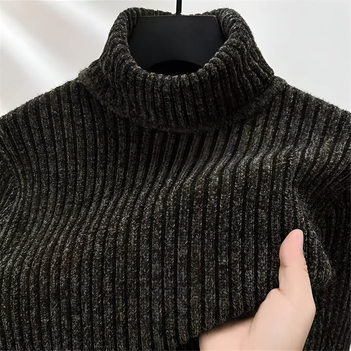 Maxwell ribbed turtleneck sweater, black colorway folded with watch