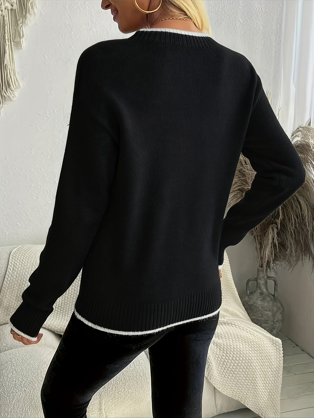 Noelle snowflake crewneck sweater, styled with coffee cup, front view