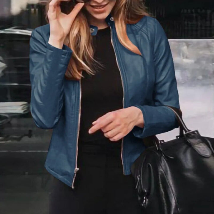 Odalys sleek faux leather jacket in blue, close-up detail view