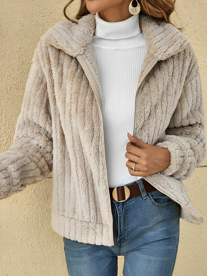 Odalys textured teddy coat in light beige, front view with zipper detail
