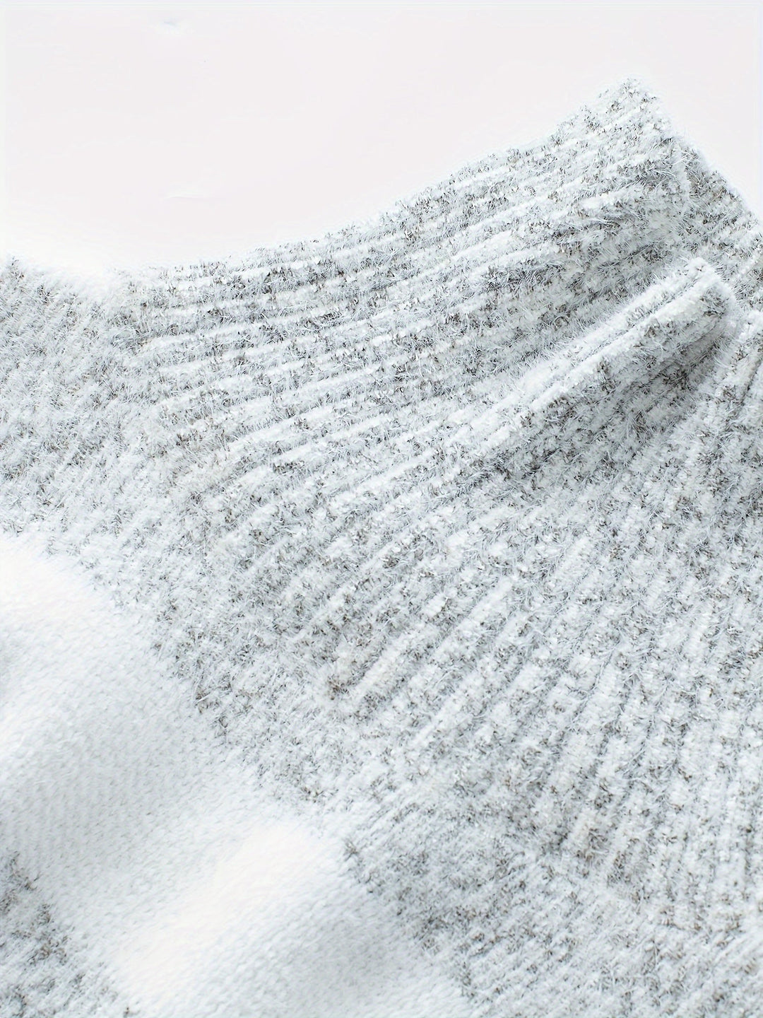 Odessa oversized striped turtleneck sweater, seated front view highlighting high neck