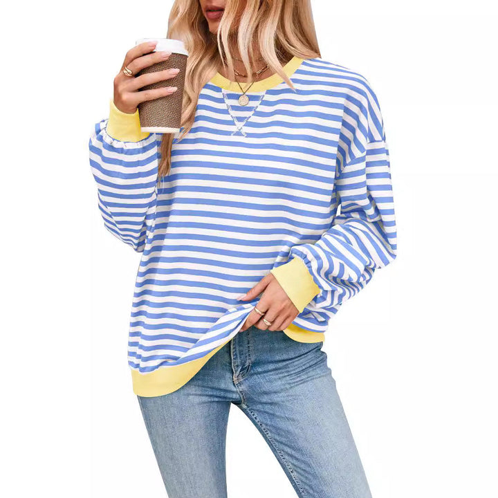 Priscilla orange and white striped sweater with blue trim, close-up front view