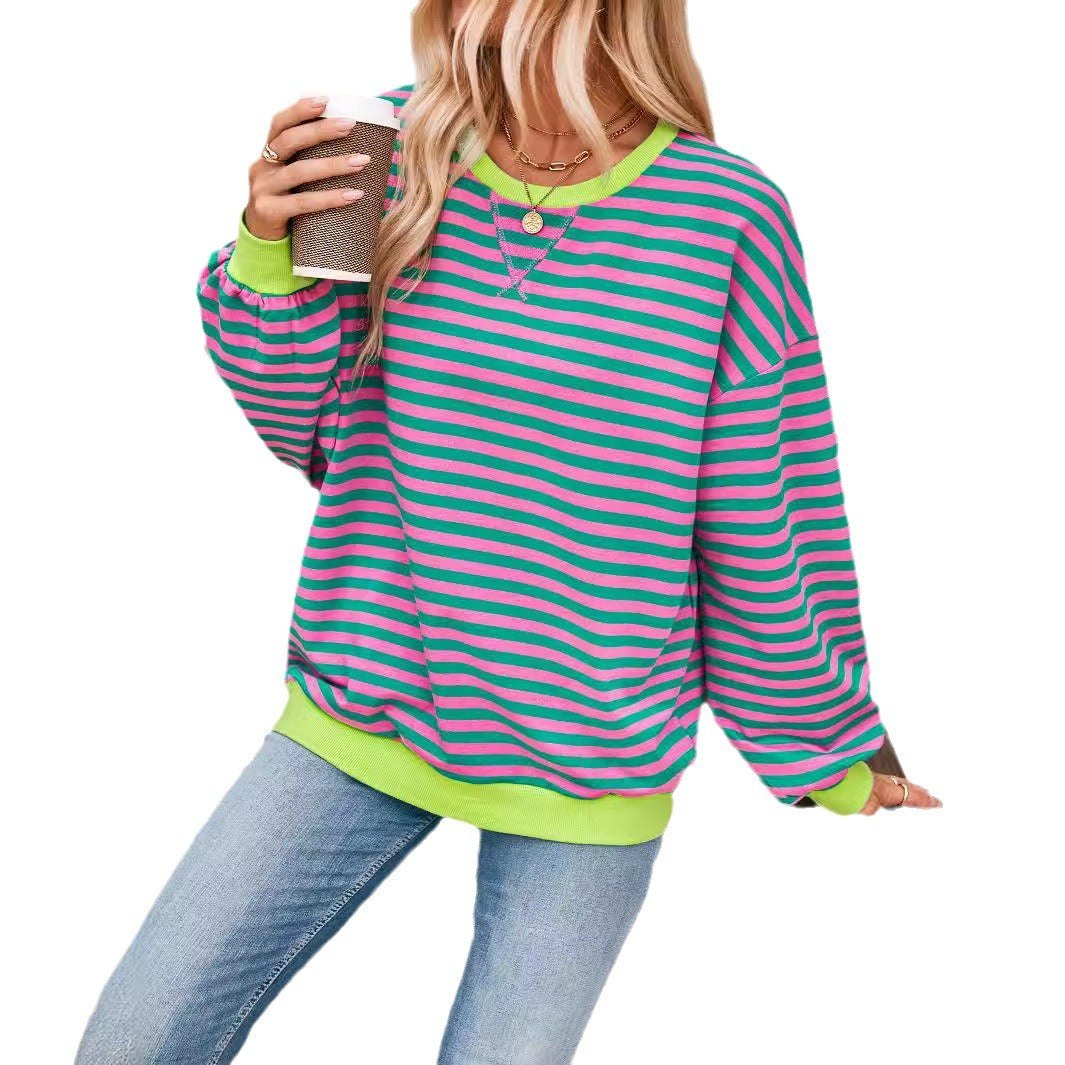 Priscilla black and white striped sweater with blue trim, lifestyle shot