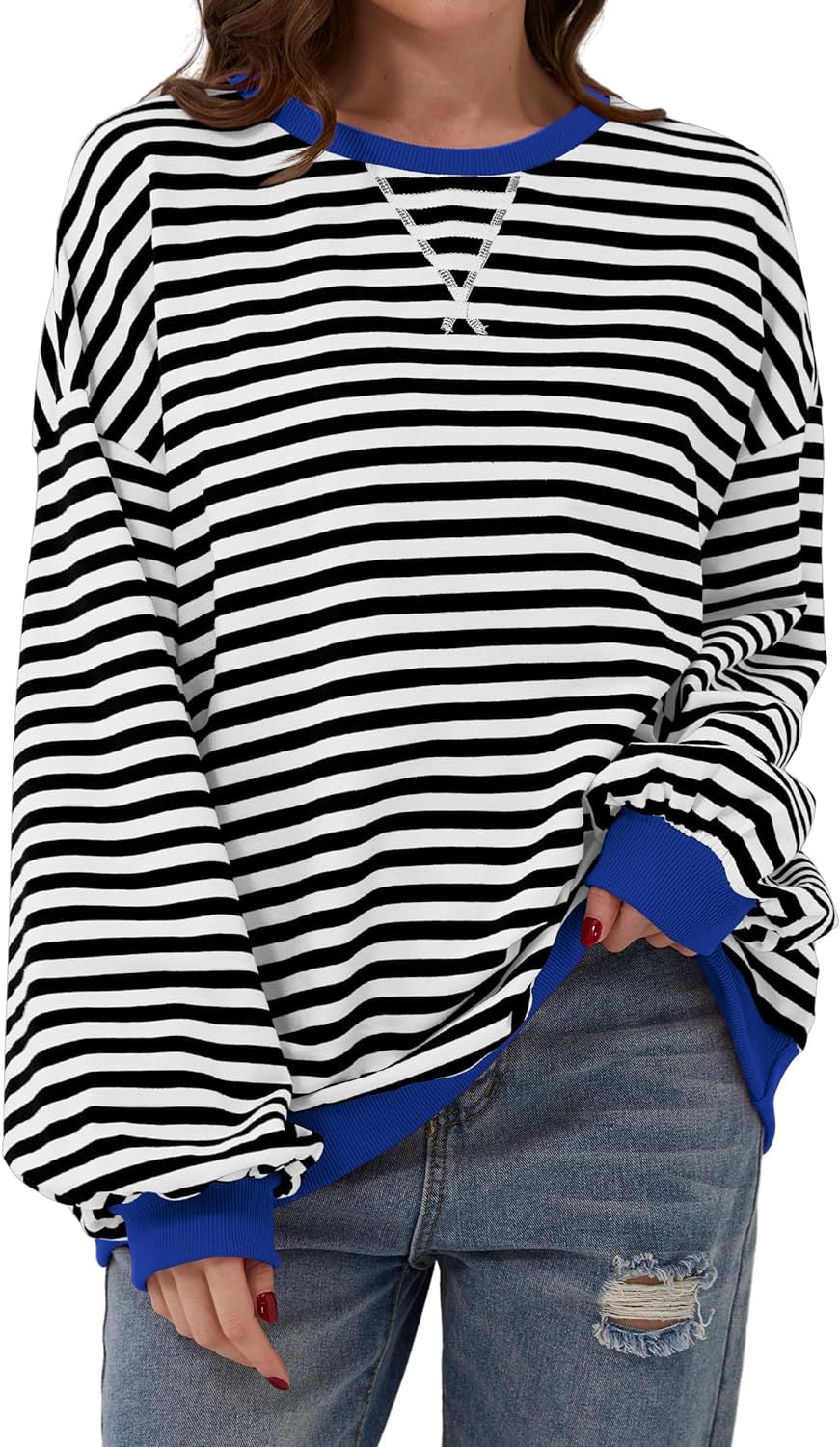 Priscilla striped sweaters displayed on clothing rack, multiple colorways