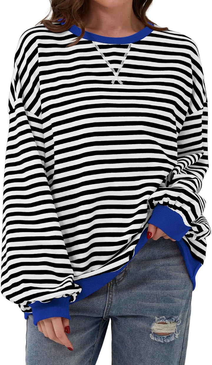 Priscilla striped sweaters displayed on clothing rack, multiple colorways