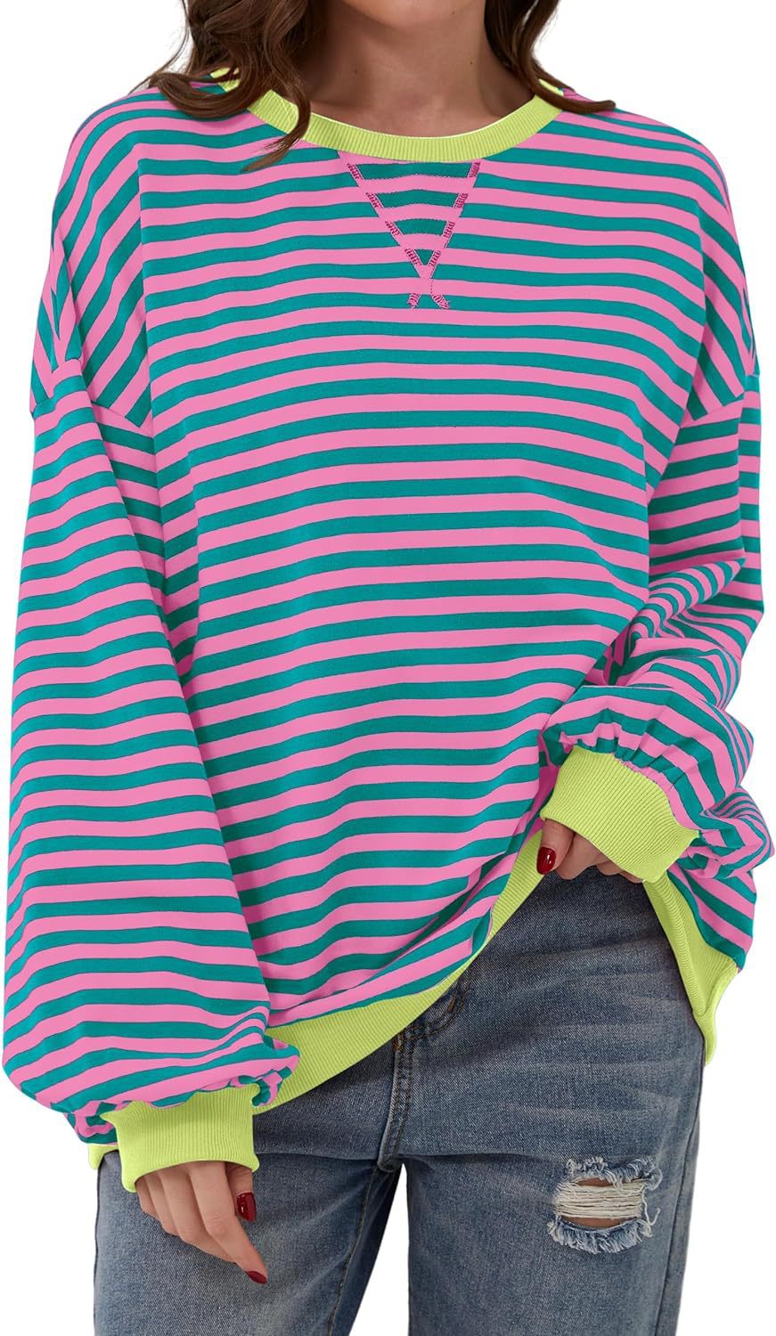 Priscilla brown and white striped oversized sweater with red trim, close-up front view