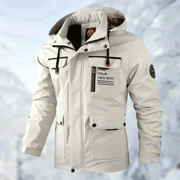 Reginald hooded waterproof jacket in cream, front view with chest pocket detail