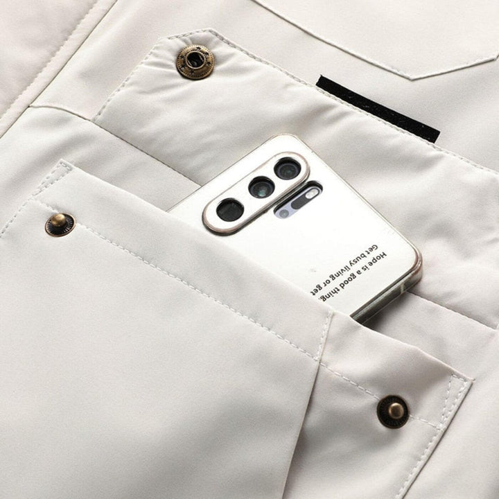 Reginald jacket chest pocket holding a smartphone