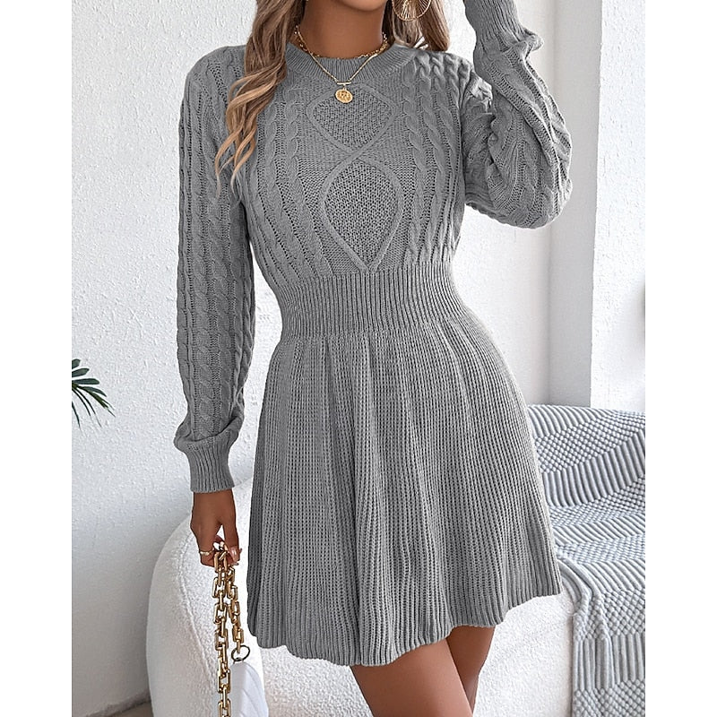 Rosalie cable-knit sweater dress, front view with hand near collar