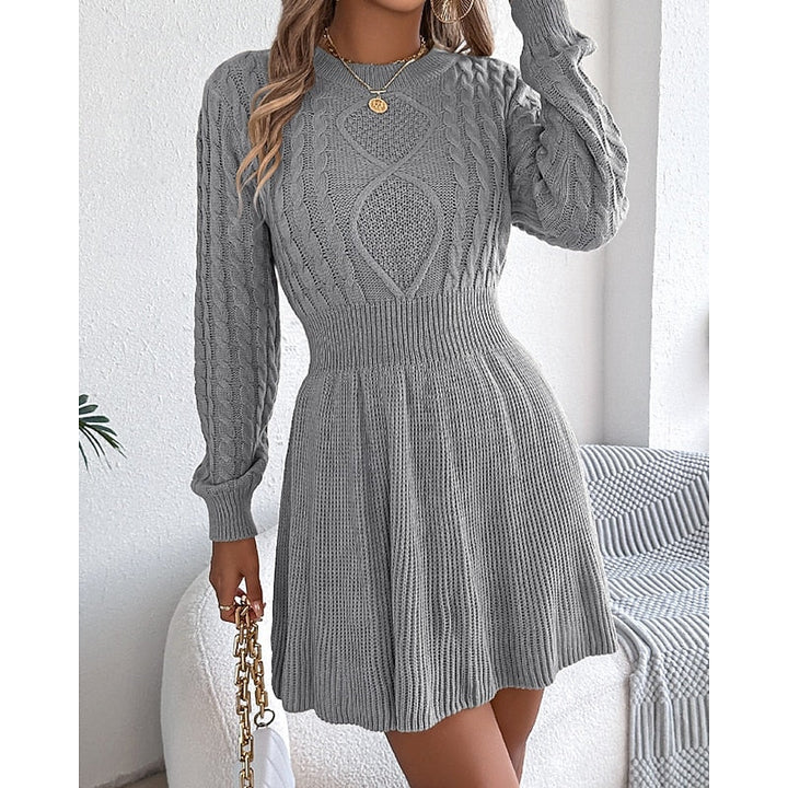 Rosalie cable-knit sweater dress, front view with hand near collar