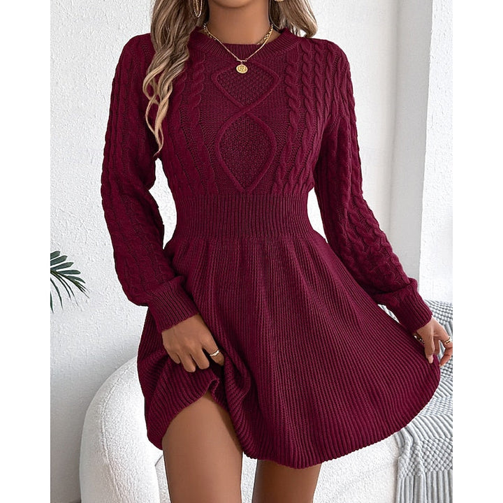 Rosalie cable-knit sweater dress, front view with hand near collar