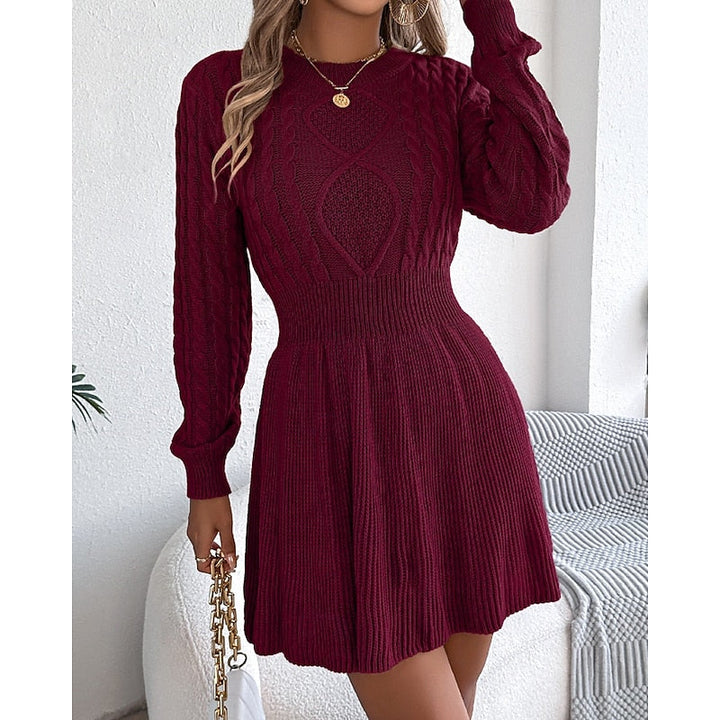 Rosalie cable-knit sweater dress, front view with hand near collar