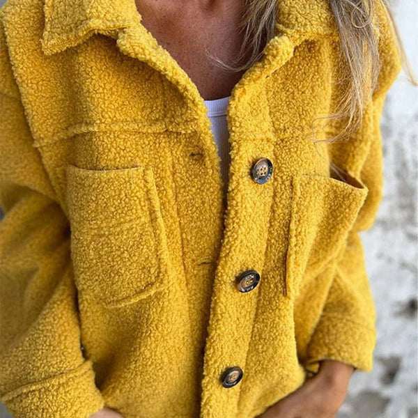 Rosalinde teddy coat front view with buttons and pockets, yellow