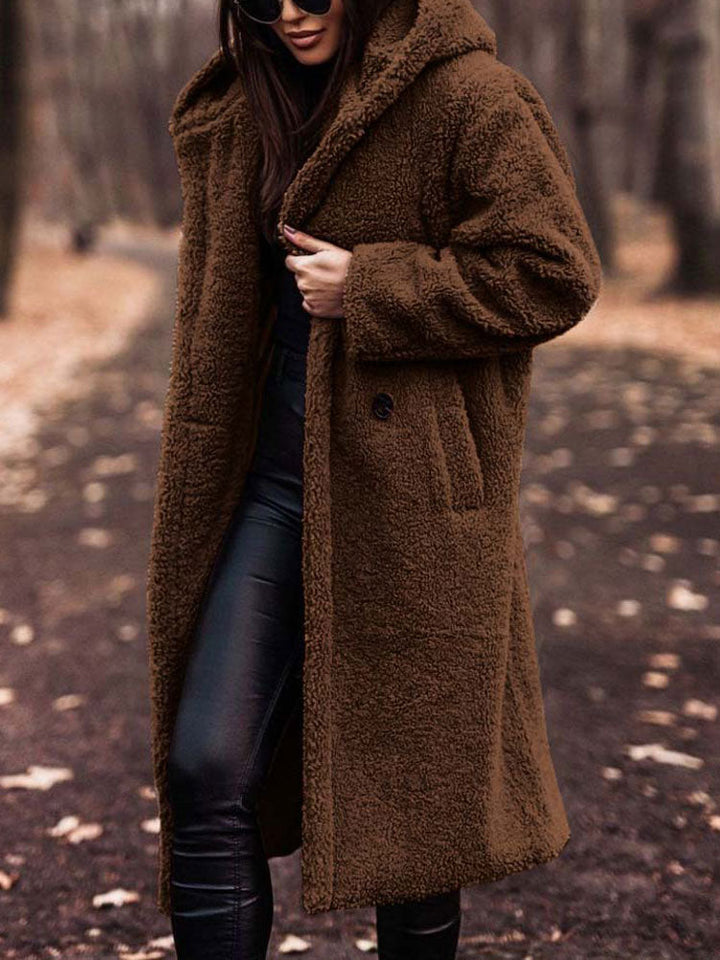 Rosamira hooded longline teddy coat in brown, front view with hands in pockets