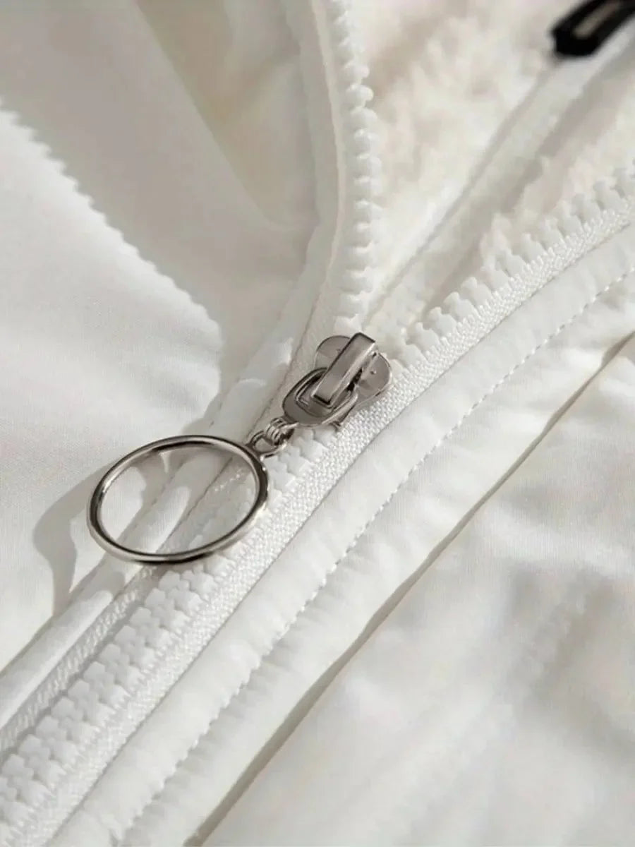 Close-up of elasticized cuff with drawstring toggle