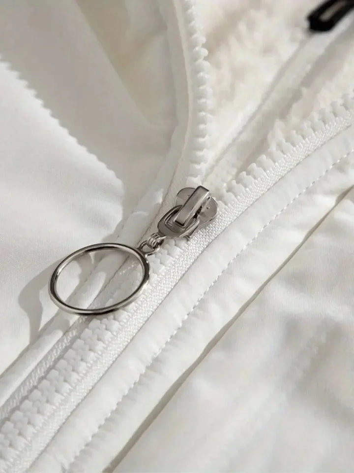 Close-up of elasticized cuff with drawstring toggle