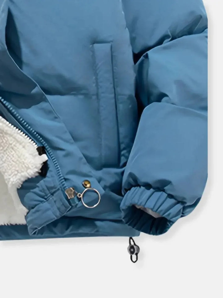 Close-up of elasticized cuff with drawstring toggle