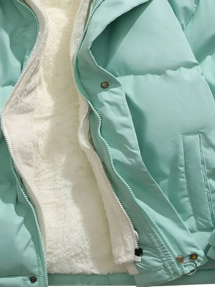 Close-up of elasticized cuff with drawstring toggle