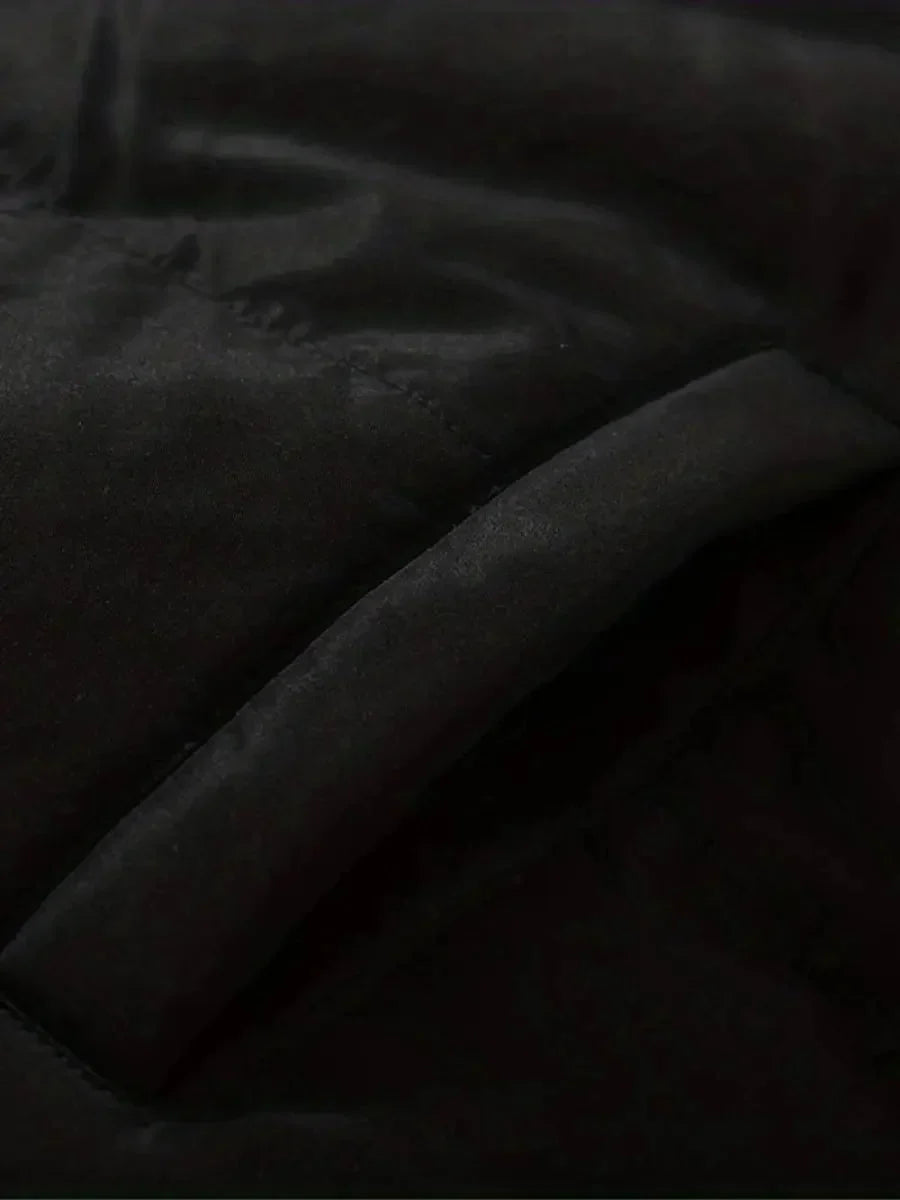 Close-up of elasticized cuff with drawstring toggle