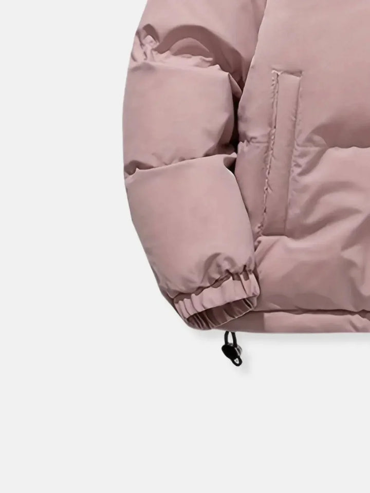 Close-up of elasticized cuff with drawstring toggle
