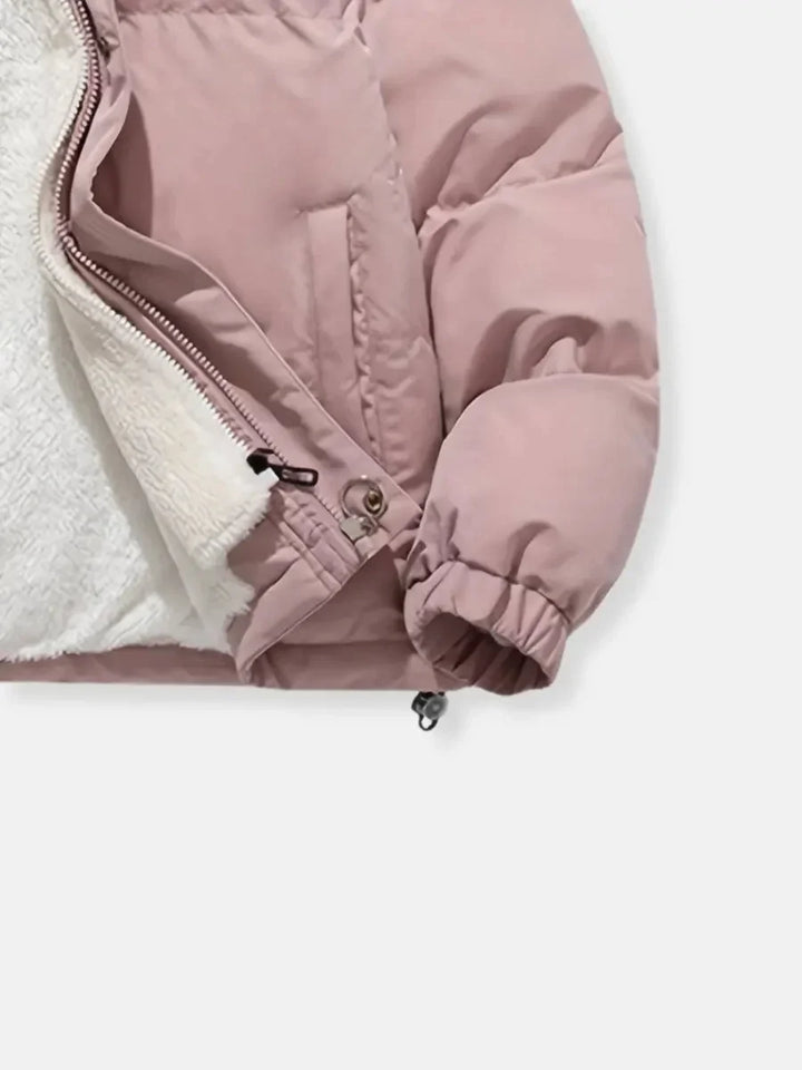 Close-up of elasticized cuff with drawstring toggle