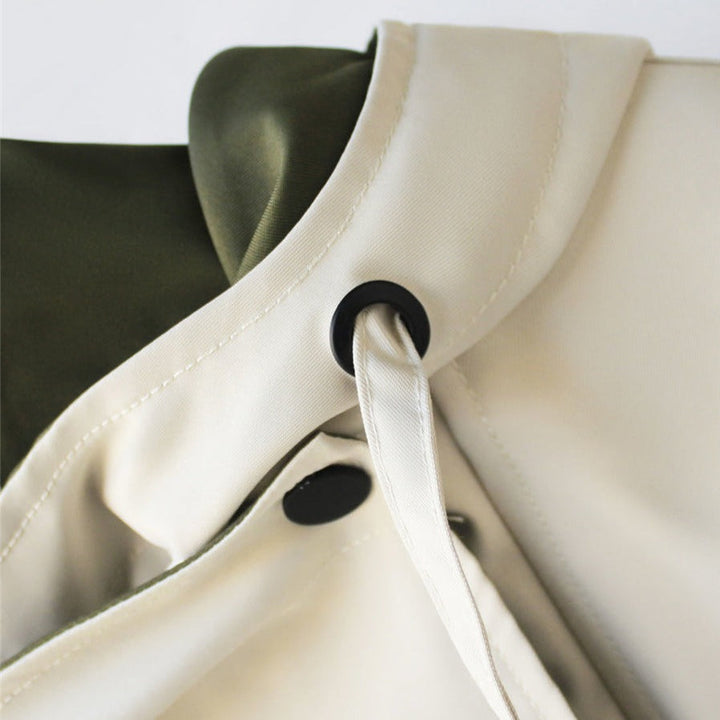 Rosamund jacket detail showing zip and snap closures