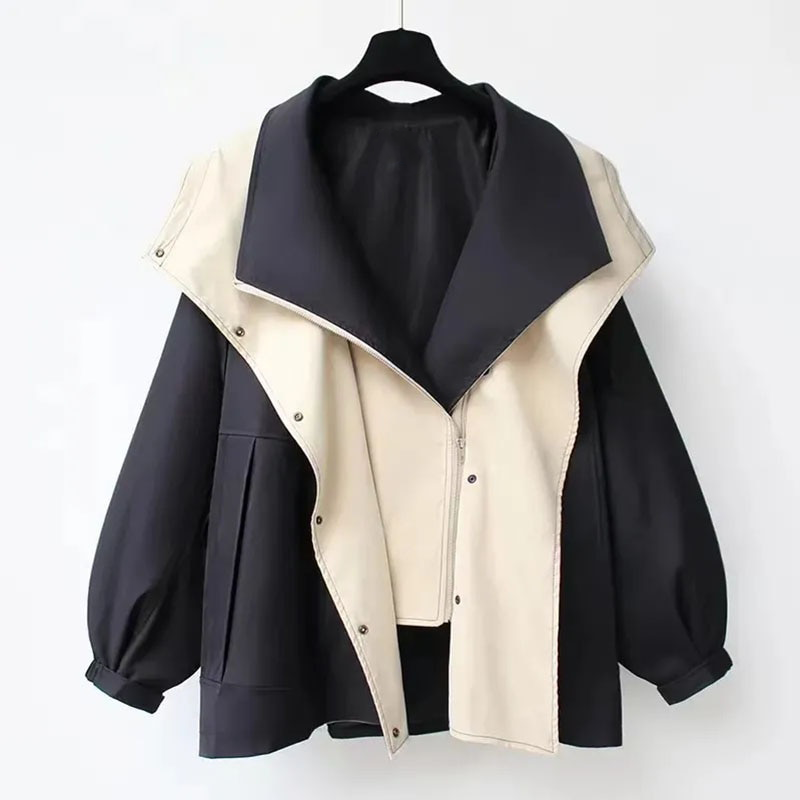Rosamund jacket detail showing zip and snap closures