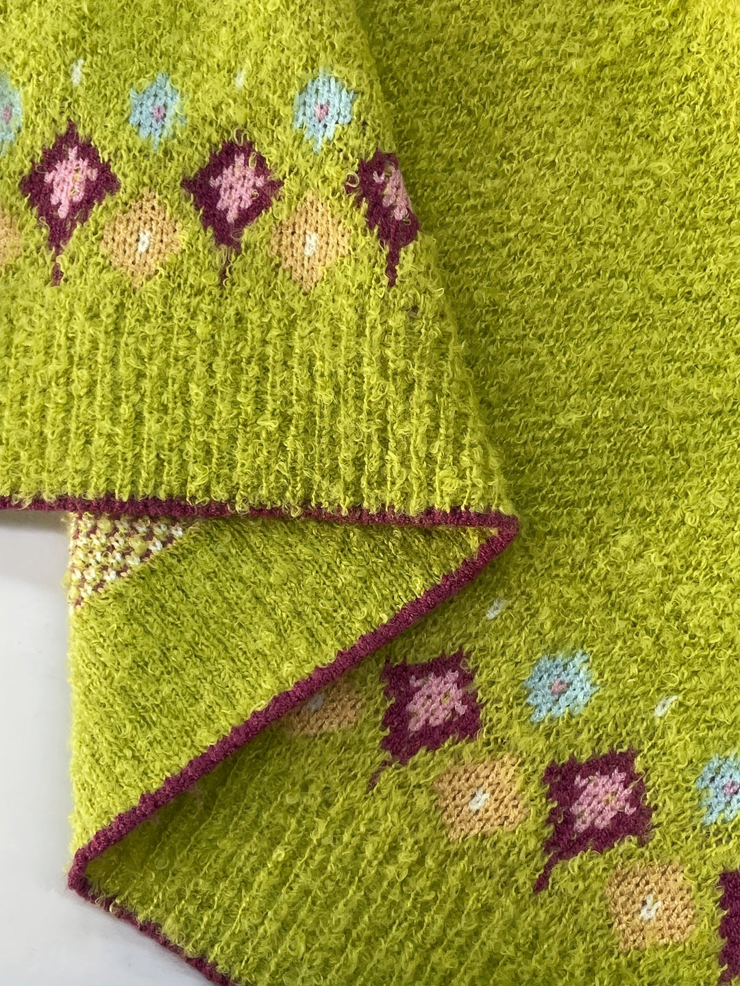 Rosemary Fair Isle button-front cardigan in greenish yellow, back view flat lay
