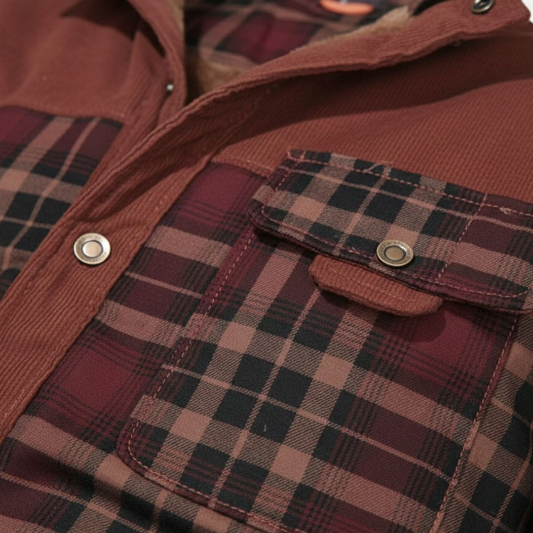 Close-up of Rowan burgundy plaid shirt jacket chest pocket and snap button detail