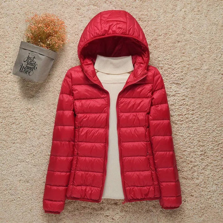 Seraphina lightweight hooded puffer jacket in black, front view