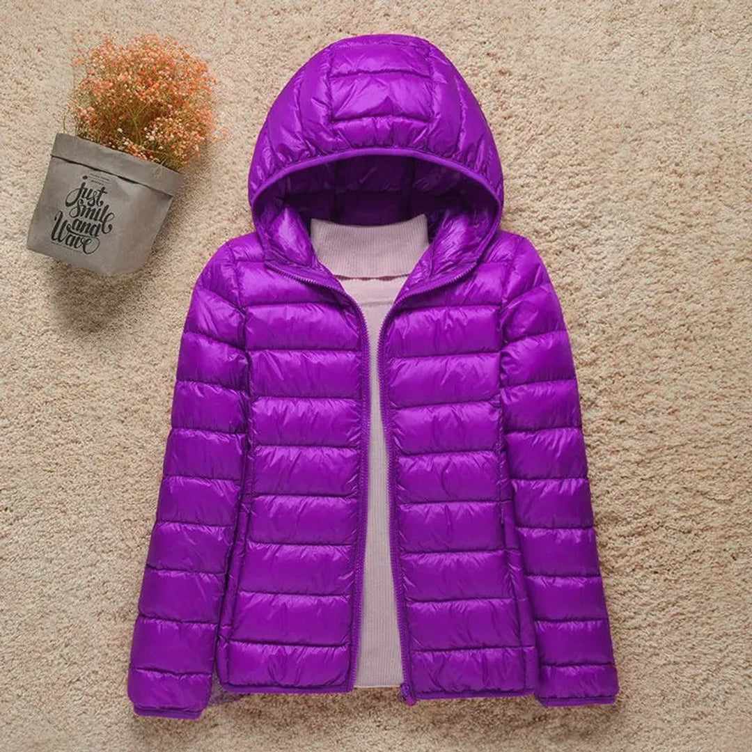 Seraphina lightweight hooded puffer jacket in black, front view