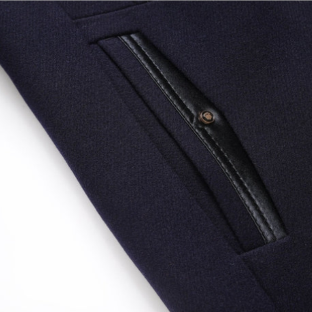 Close-up of Sterling coat besom pocket with leather-look trim