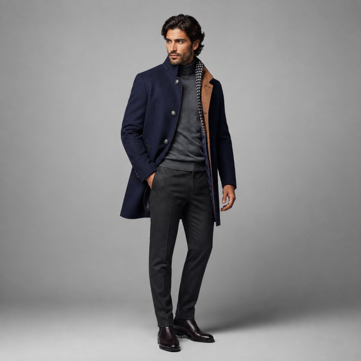 Man wearing Sterling navy wool coat over gray turtleneck sweater, full outfit