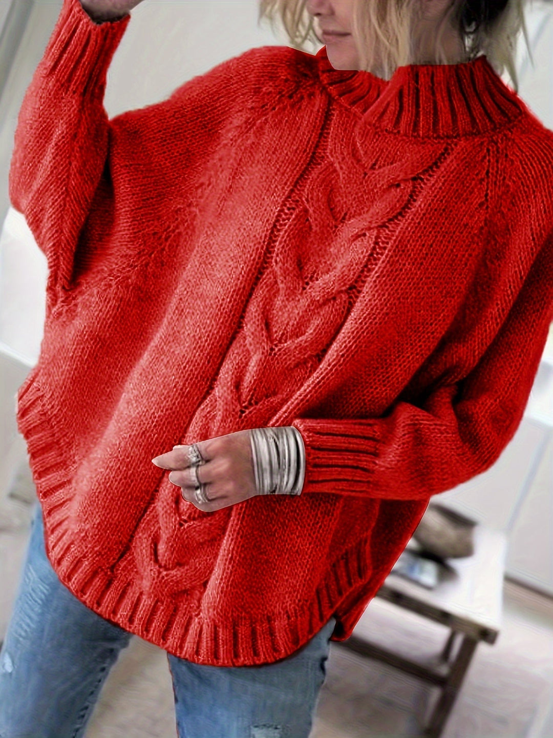 Sylvie oversized cable-knit high-neck sweater in red, front view