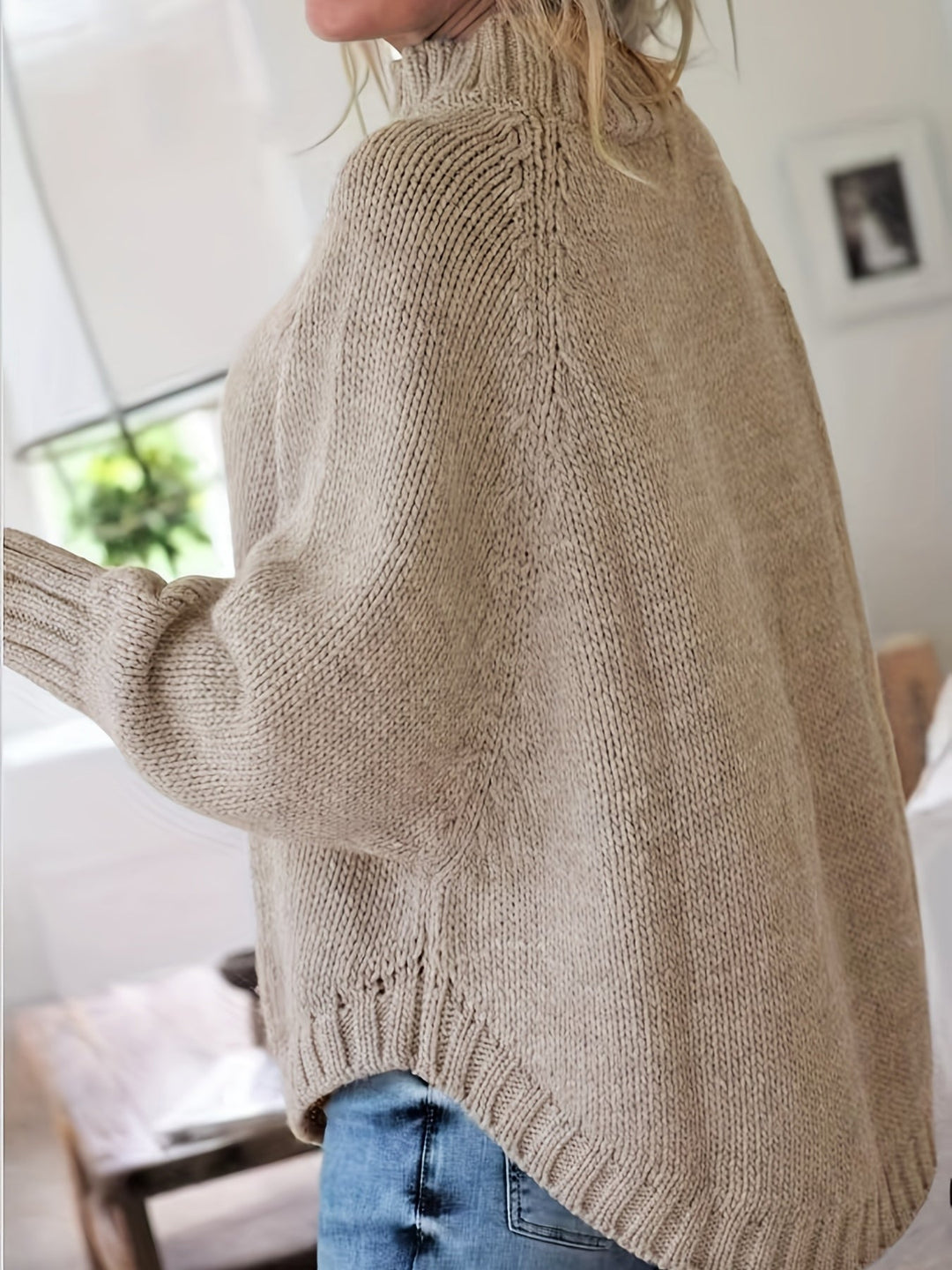 Sylvie oversized cable-knit high-neck sweater in gray, back view