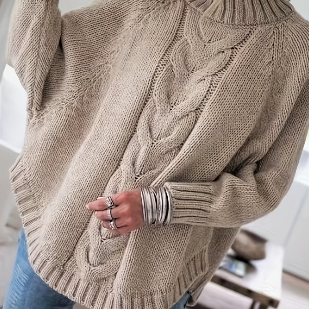 Sylvie oversized cable-knit high-neck sweater in gray, back view