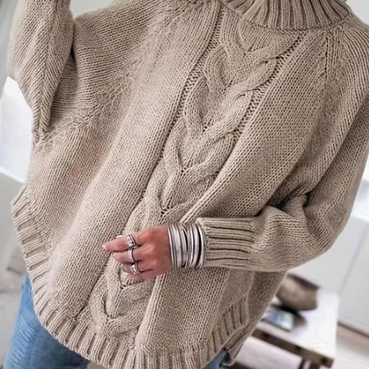Sylvie oversized cable-knit high-neck sweater in gray, back view