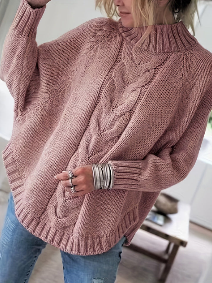 Sylvie oversized cable-knit high-neck sweater in pale pink, front view