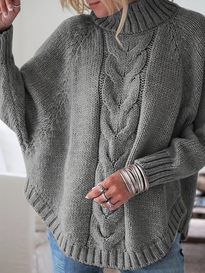 Sylvie oversized cable-knit high-neck sweater in gray, back view