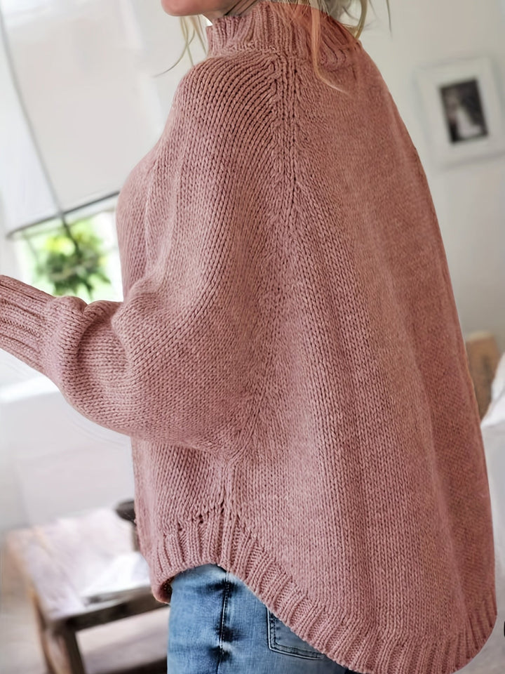 Sylvie oversized cable-knit high-neck sweater in gray, back view