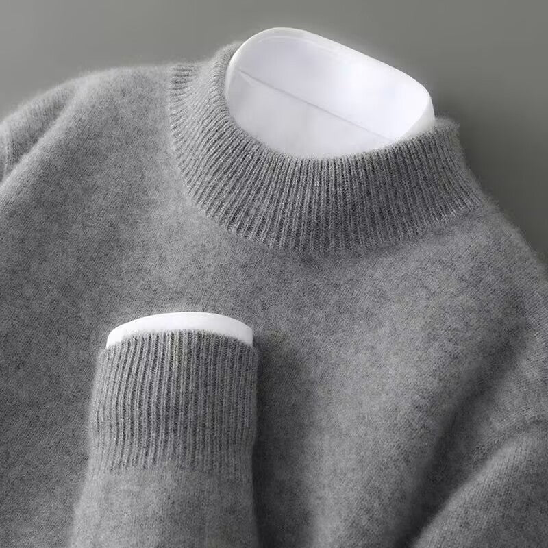 Close-up of Theodore sweater ribbed collar and cuff detail in gray