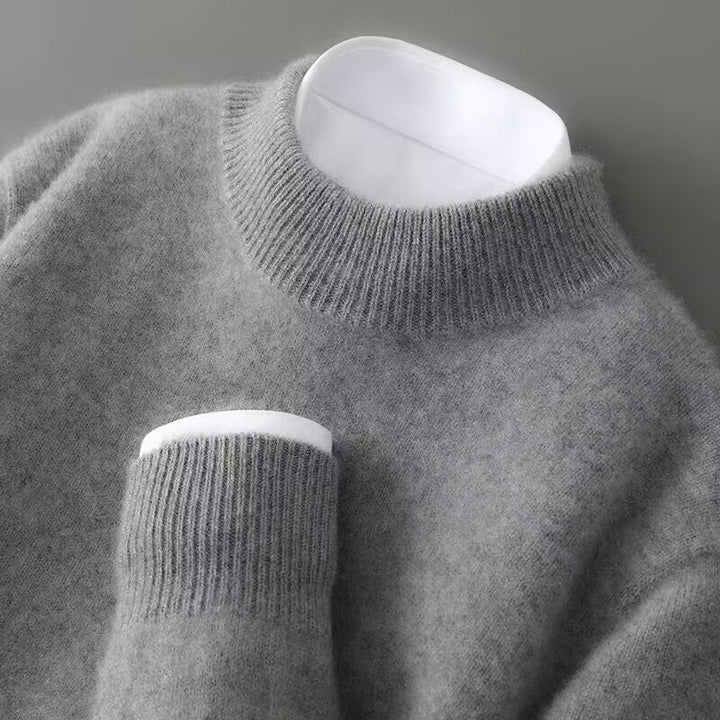 Close-up of Theodore sweater ribbed collar and cuff detail in gray